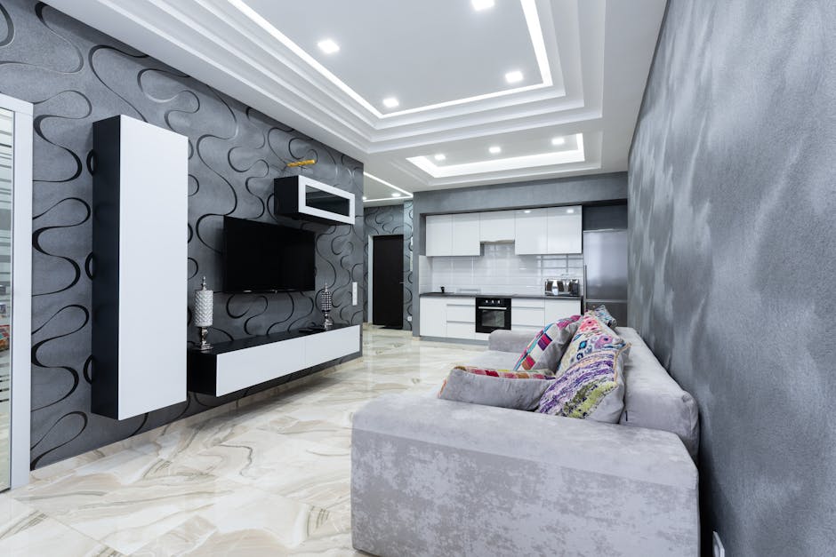 Ściana TV w salonie w bloku: ukrycie kabli, zabudowa i akustyka krok po kroku
